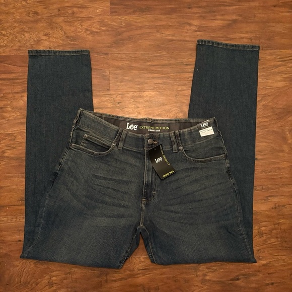 NWT MEN'S EXTREME MOTION TAPERED LEG JEAN SIZE 34x34 - Picture 9 of 9